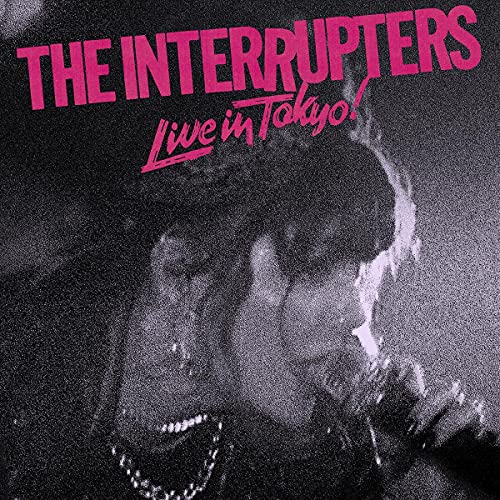 CD cover for The Interrupters’ “Live In Tokyo!” featuring a vocalist.