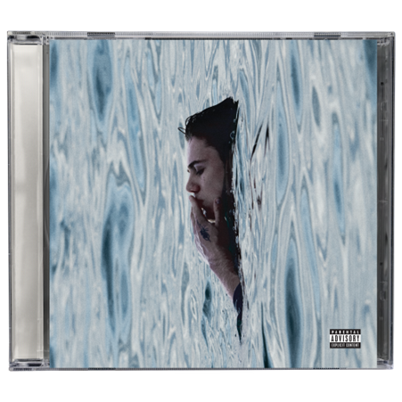 CD case with a portrait of a man partially submerged in water.