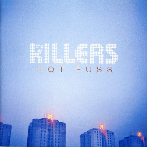 The Killers' "Hot Fuss" CD cover with a blue cityscape background.