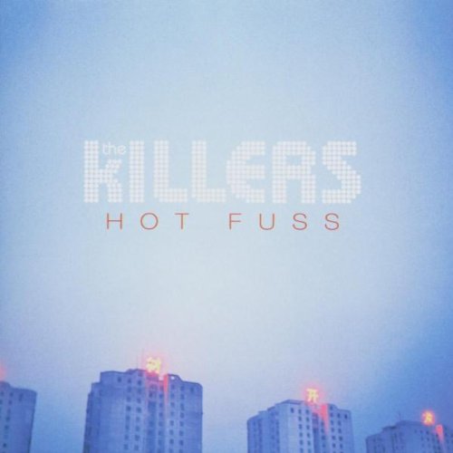 The Killers Hot Fuss CD cover showing city buildings against a pale blue sky.