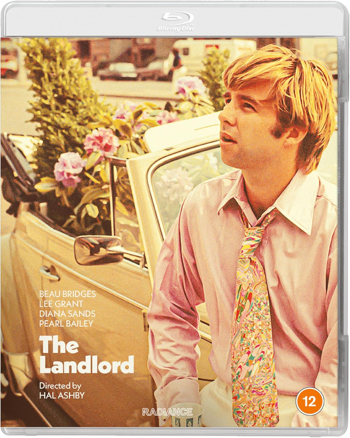 Blu-ray cover for "The Landlord" featuring Beau Bridges in a pink shirt.