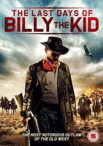 Man in cowboy hat and leather jacket stands in desert with horse and outlaws behind.