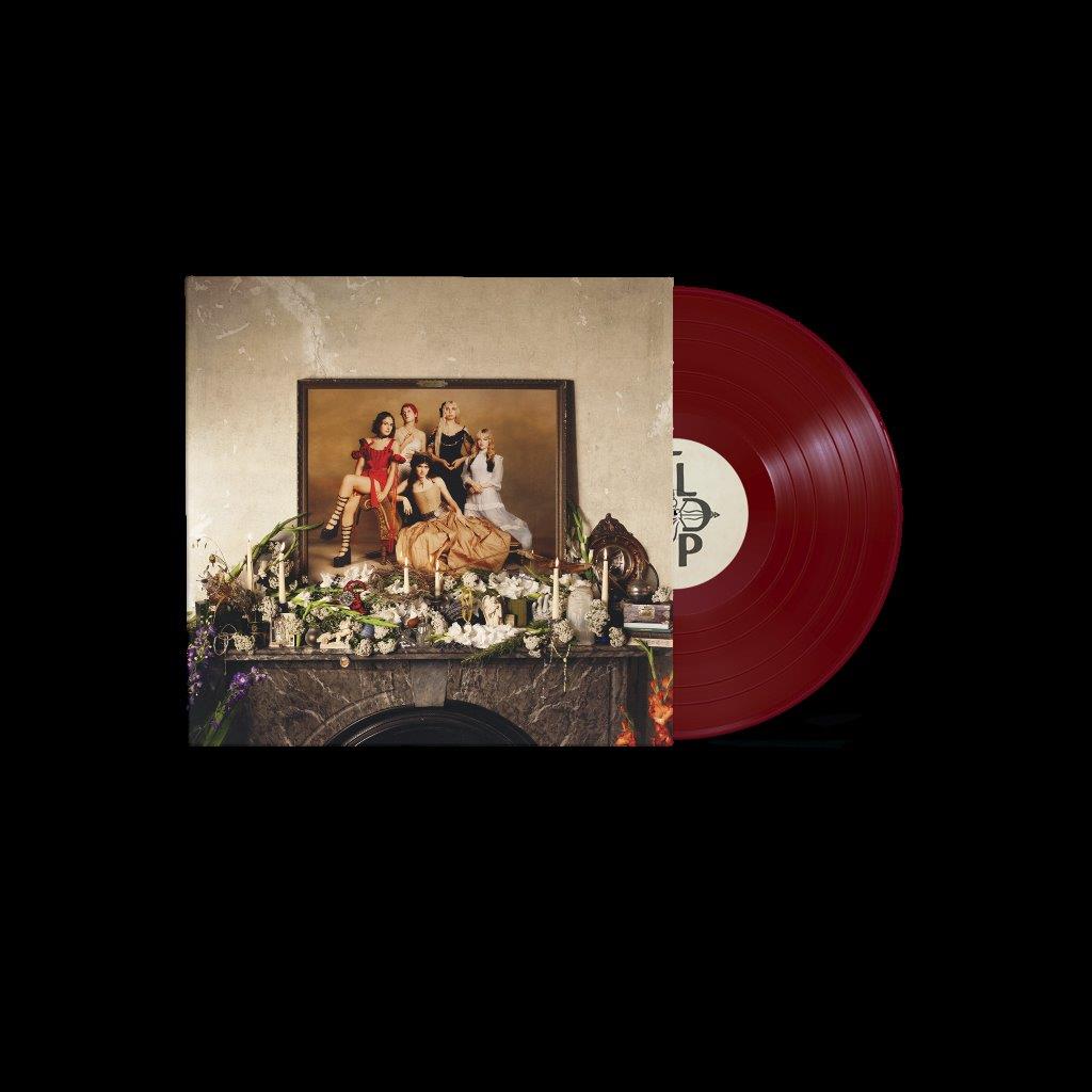 Red vinyl record with album art depicting a painting and floral arrangement.