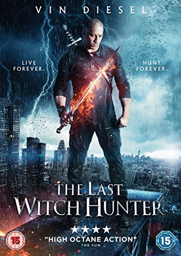 Vin Diesel stands on a rooftop holding a flaming sword against a stormy city background.