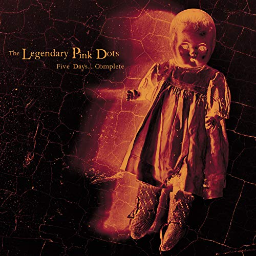 "Vinyl album cover featuring a creepy doll with a cracked, dark background."