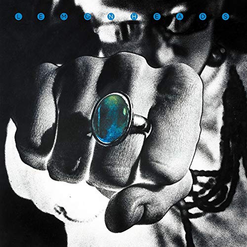 Black and white album cover featuring a hand holding a ring.