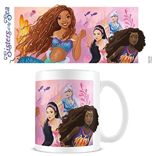 White mug featuring diverse mermaid sisters illustration from The Little Mermaid.
