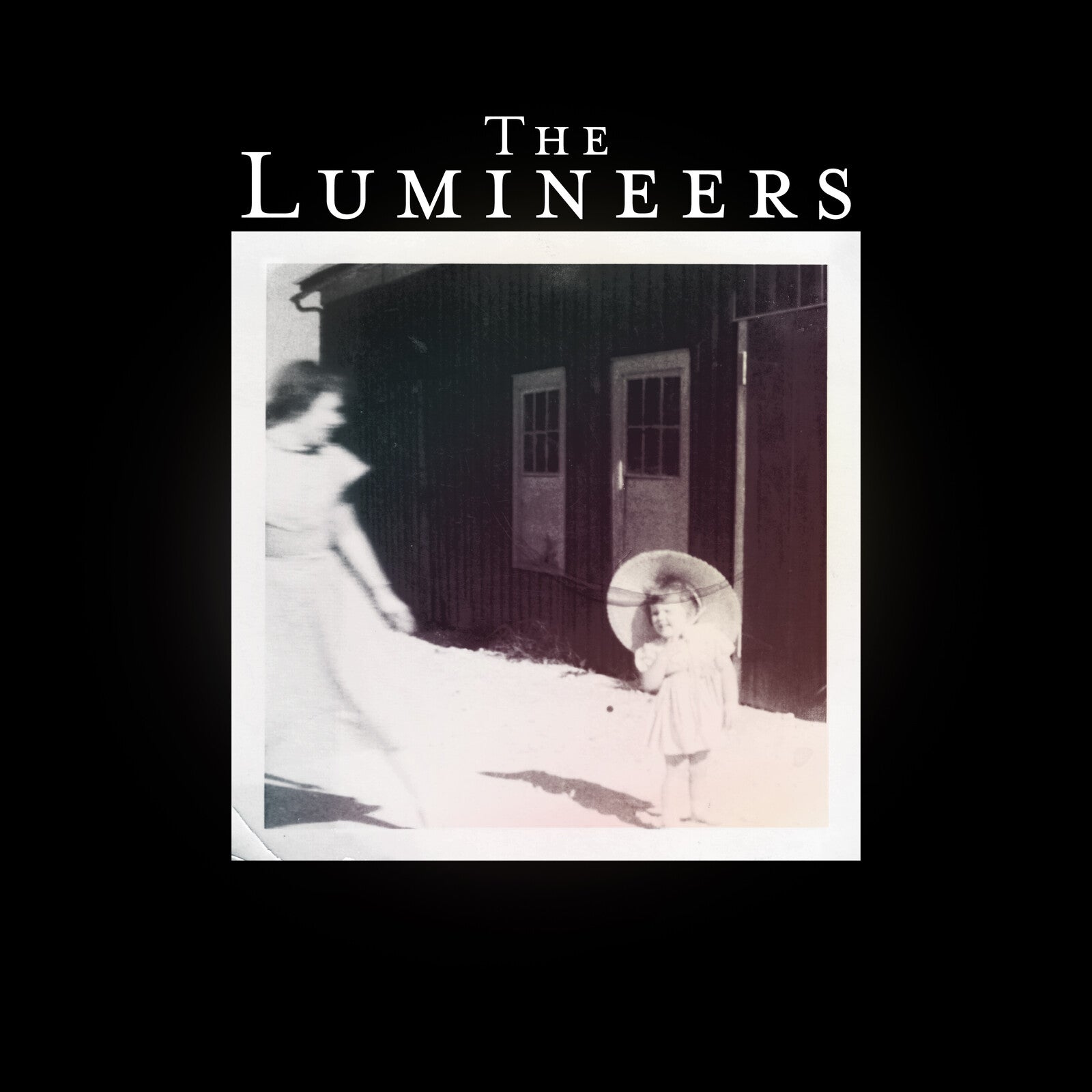 The Lumineers album cover: black and white photo of children.