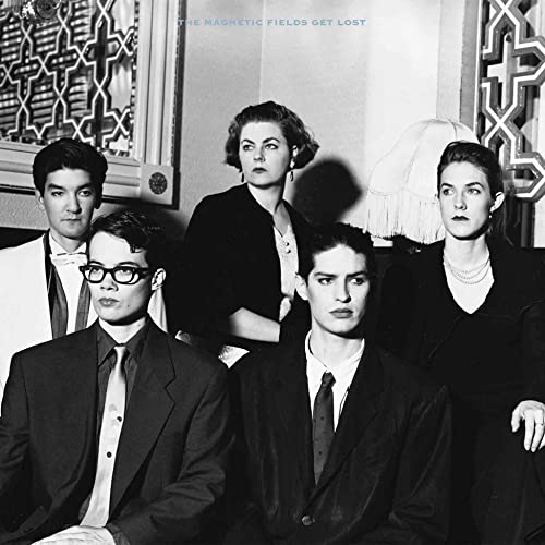 Black and white portrait of The Magnetic Fields band members.