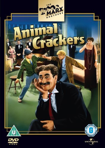 DVD cover for "Animal Crackers" featuring The Marx Brothers in a chaotic scene.
