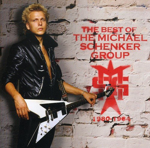 Album cover with man holding guitar, wearing black leather, against a white brick wall.