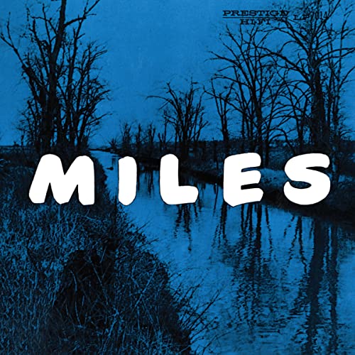 Blue vinyl record cover with “MILES” in white lettering and trees.