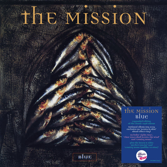 The Mission" album cover: textured blue surface with many eyes.