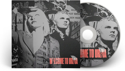 CD case with black and white portraits of three people, text “Welcome to Urbia”.