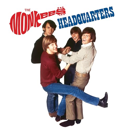 The Monkees album cover, four men in 1960s attire playfully posing.