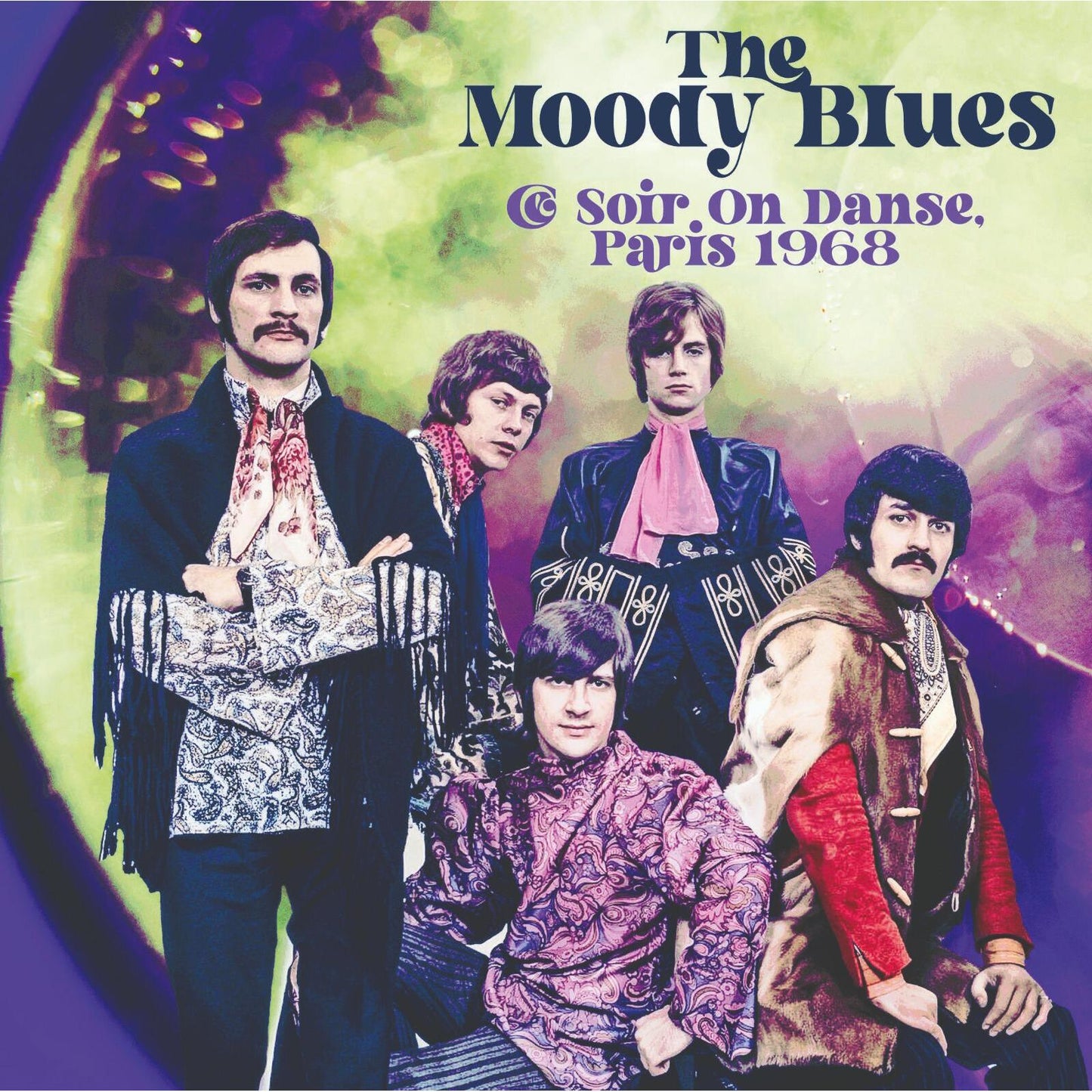 The Moody Blues band members posing against a colorful, abstract, psychedelic background.