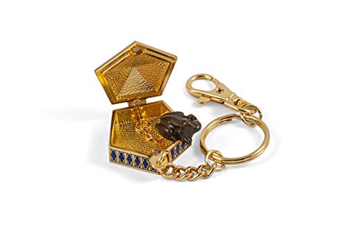 Gold-colored chocolate frog keychain with a hinged, hexagonal box.