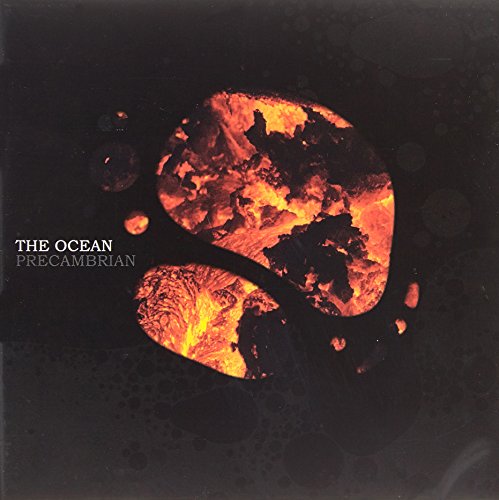Album cover with fiery orange planet imagery on a black background with "The Ocean Precambrian" text.
