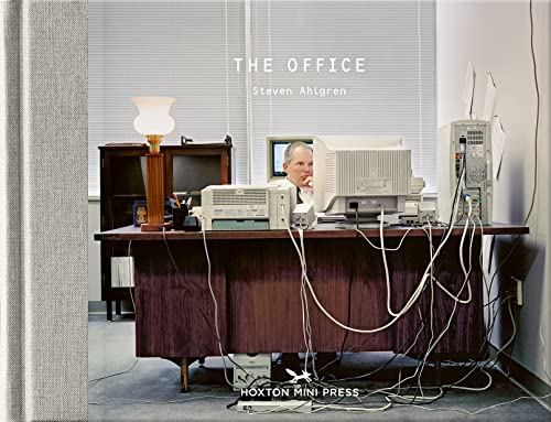 Book cover depicting a 1980s office with a man at a computer.