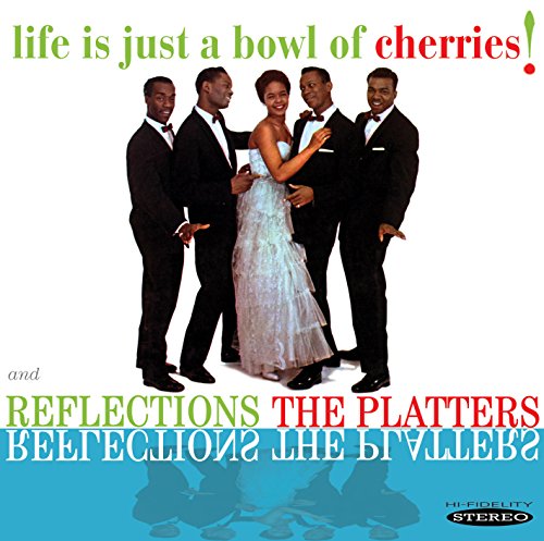 "Album cover featuring The Platters, a woman and four men in formal attire."