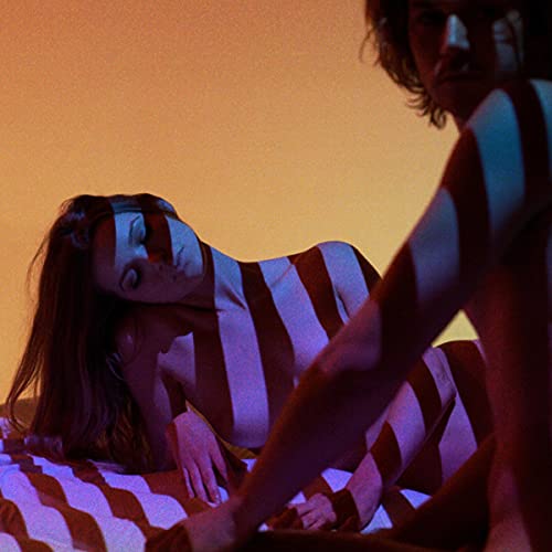 Two people with striped shadows on their bodies, orange background.