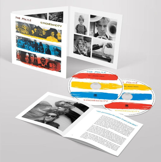 Open CD case for The Police Synchronicity showing band photos and a striped disc.