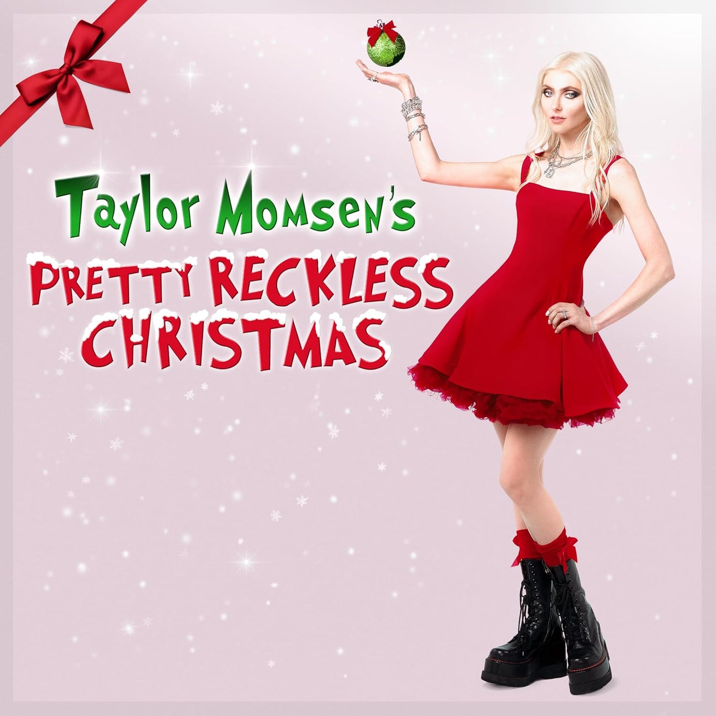 Album cover for "Pretty Reckless Christmas" featuring Taylor Momsen in red dress.