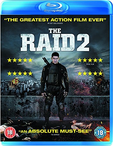 Blu-ray cover for "The Raid 2" featuring a man with a gun.