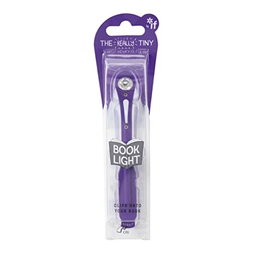 A purple clip-on book light in its original retail packaging.