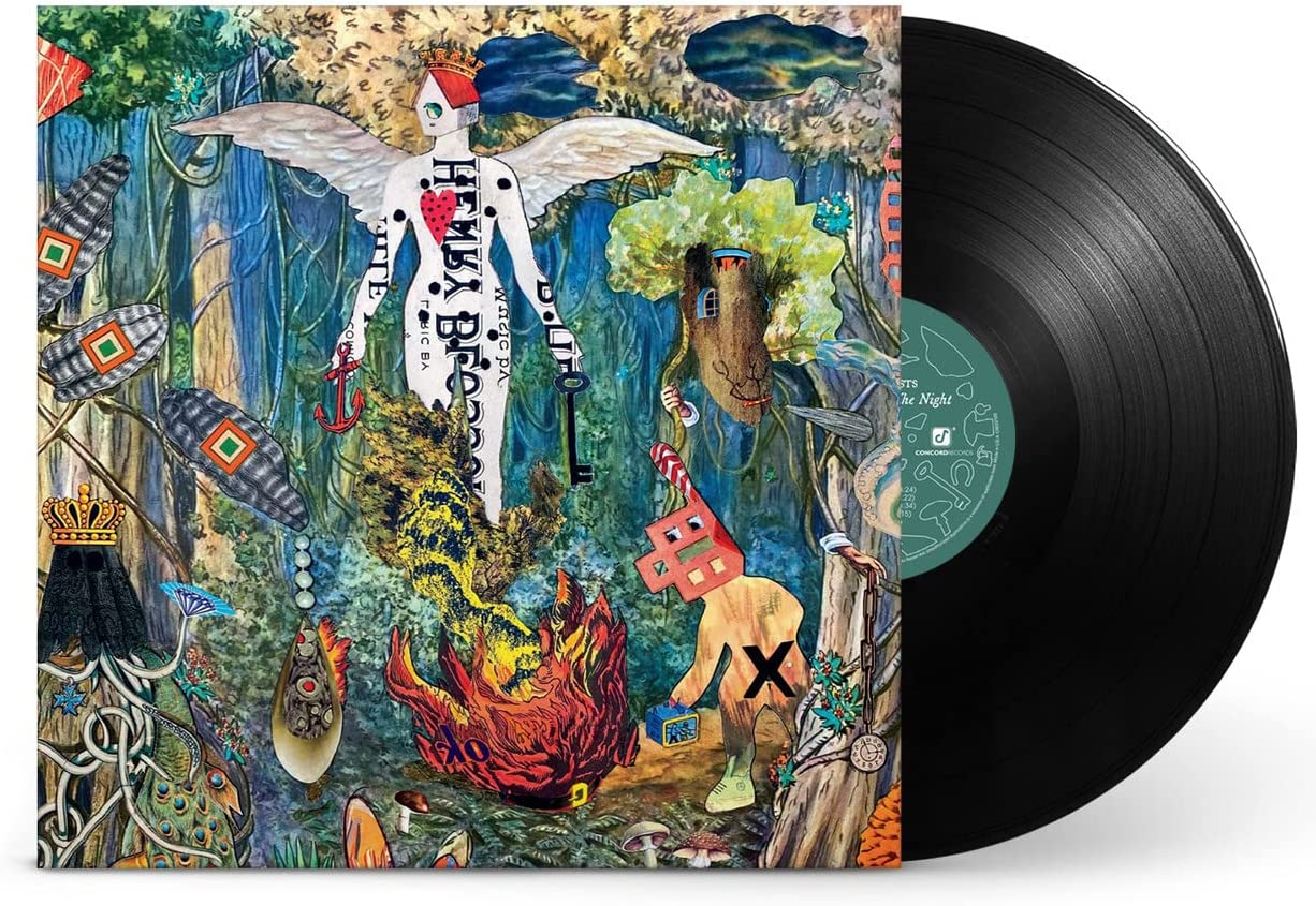 Vinyl record with colorful album cover featuring surreal illustrations and a black disc.