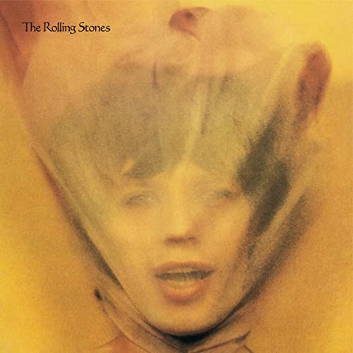The Rolling Stones album cover with a woman's face partially obscured by veil.