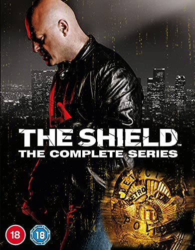 The Shield Complete Series Blu-ray cover featuring a bald man and police badge.