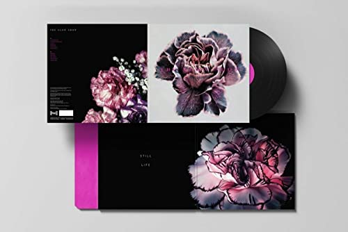 The Slow Show Still Life vinyl record with gatefold sleeve featuring dark floral imagery.