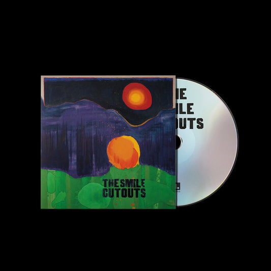 CD case for "The Smile - Cutouts" with abstract landscape art.