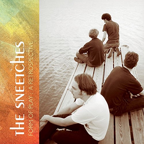 "Album cover featuring four men sitting on a wooden dock, sepia-toned, with title banner."