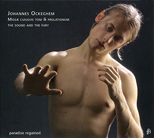 Shirtless man with long hair posing against a black background on a CD cover.