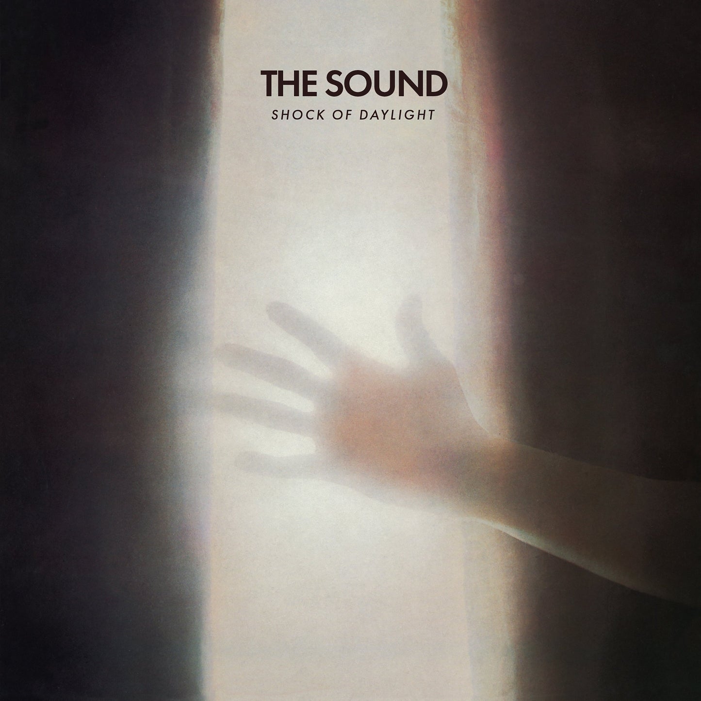 CD cover for "The Sound - Shock Of Daylight" with a hand shadow.