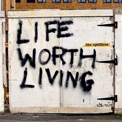 "Album cover with white gate and 'Life Worth Living' graffiti, featuring 'the spitfires' label."