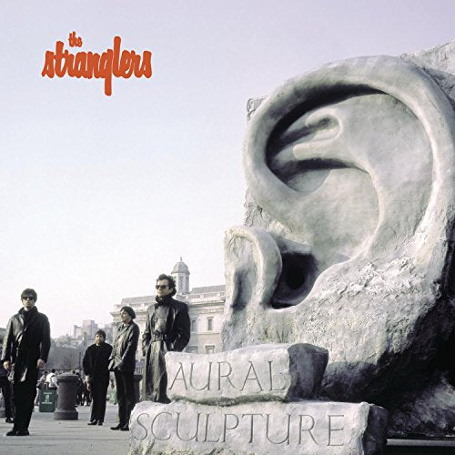 Album cover for The Stranglers’ “Aural Sculpture” featuring a large ear sculpture.
