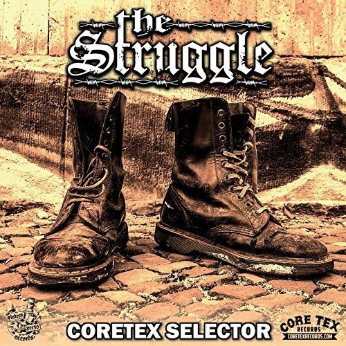 Two black combat boots on a cobblestone surface with the text The Struggle above.