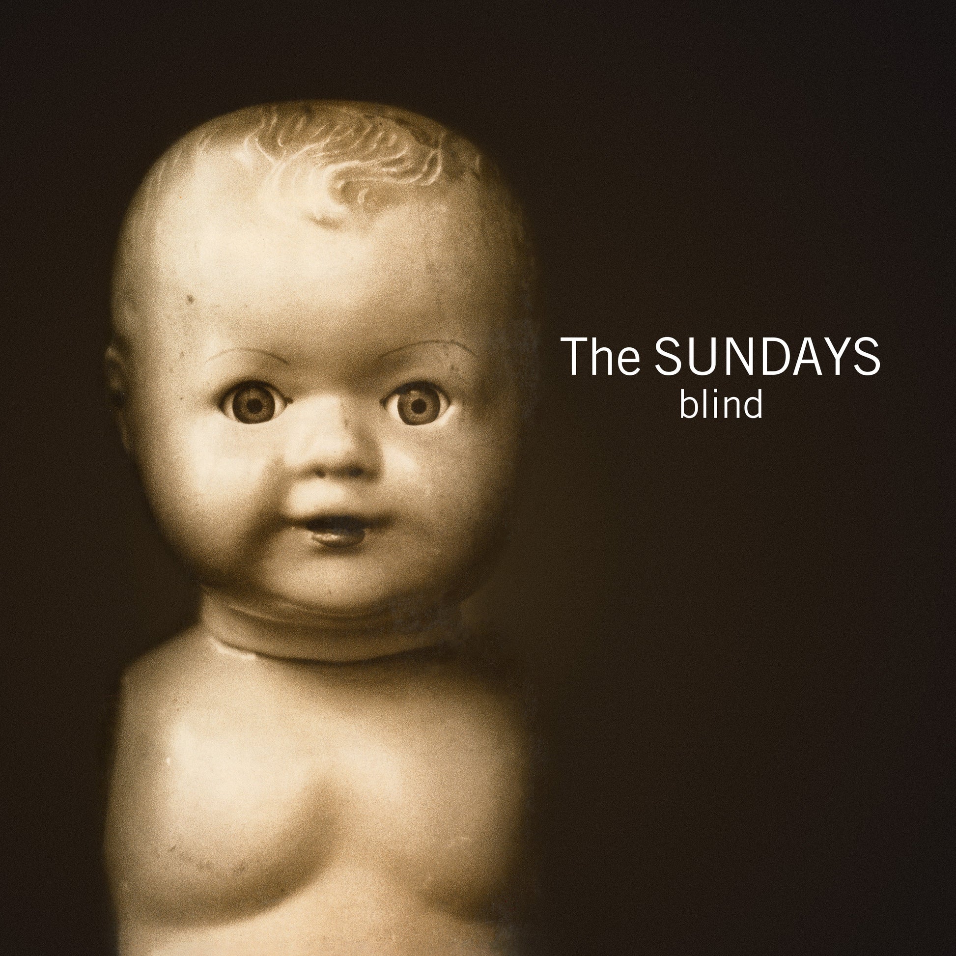 Vintage doll portrait with text: "The Sundays blind" album cover.