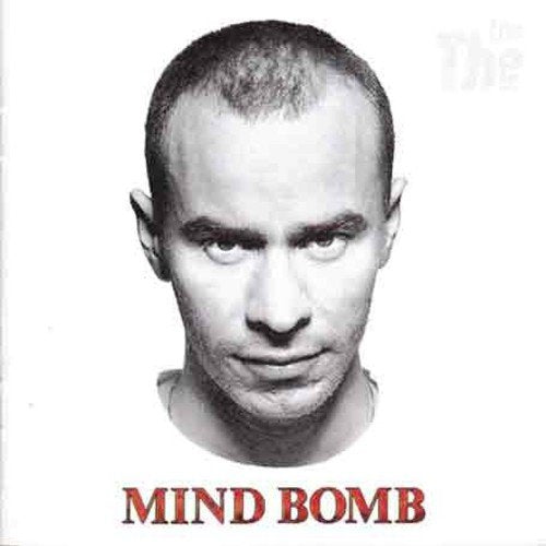Black and white CD cover featuring a man’s face and “Mind Bomb” text.