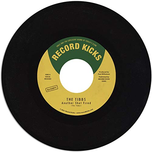 Black 7-inch vinyl record with a yellow and white label, text details visible.
