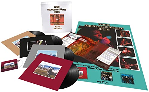 The Tragically Hip “Road Apples” vinyl record set with inserts and photos.
