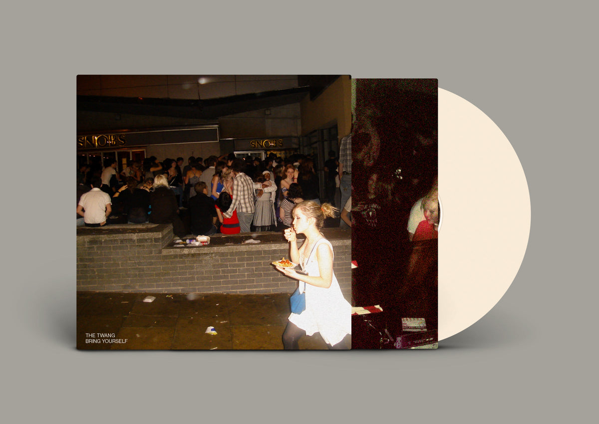 Vinyl record of The Twang’s “Bring Yourself” with a crowd scene cover.