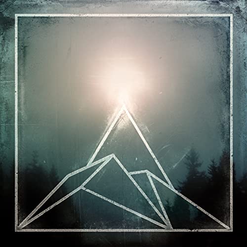 The Used album cover: white mountain peaks against a hazy, dark background.