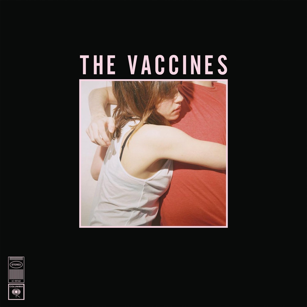 Album cover for The Vaccines, featuring a person embraced in red.