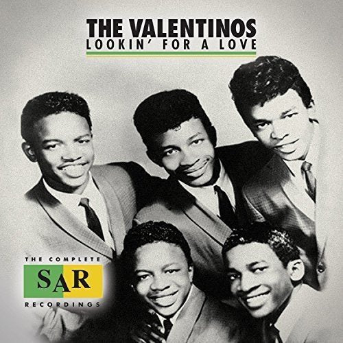 "Black and white CD cover featuring The Valentinos, a group of five men in suits."