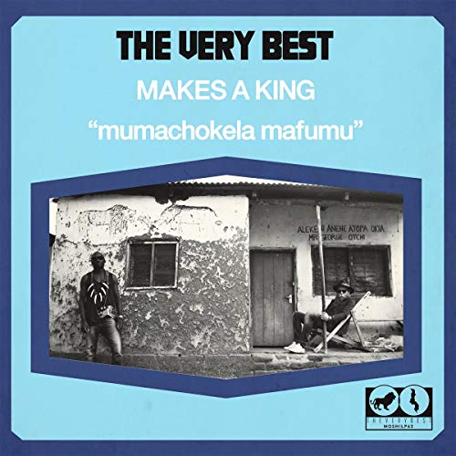 Vinyl album cover featuring two men outside a building, blue background.