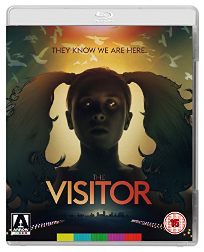 The image depicts a Blu-ray case for "The Visitor". Alt text: Blu-ray case with a dark child and winged creatures on the cover.